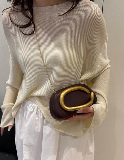 Metal decor clutch bag
