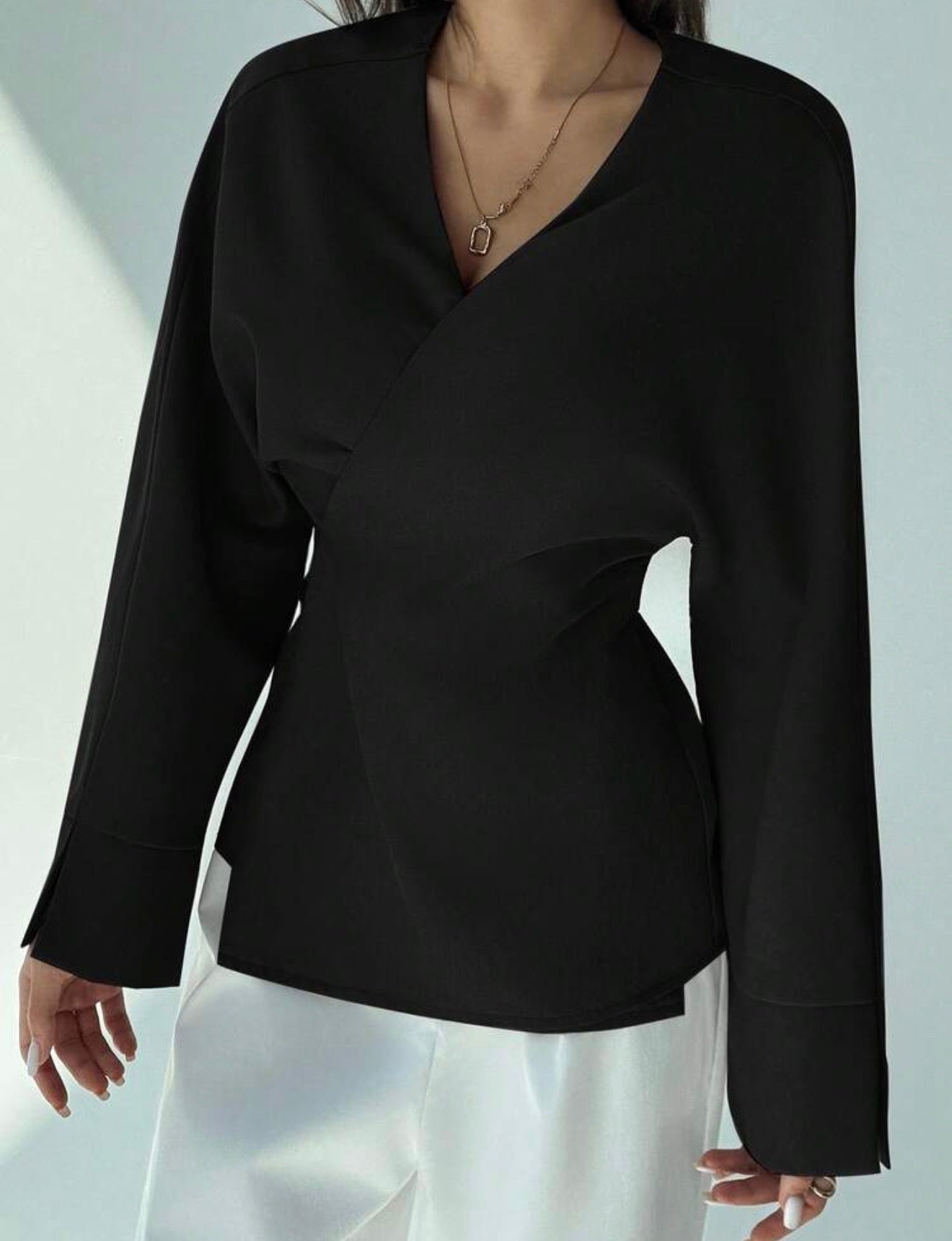 Waist cinched long sleeve blouse