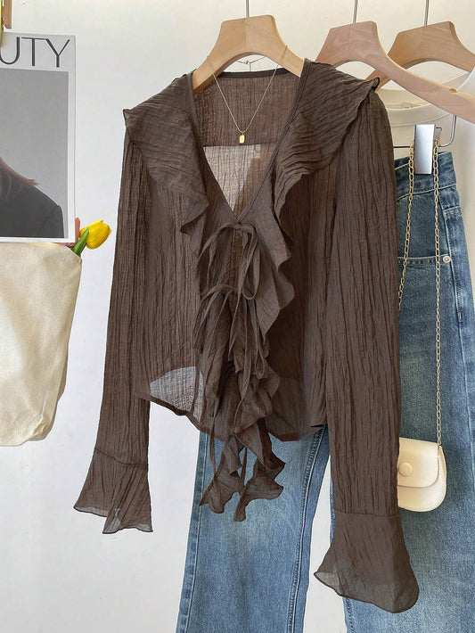 Ruffle tie blouse
