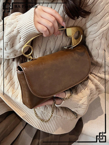 Brooch hand&cross bag