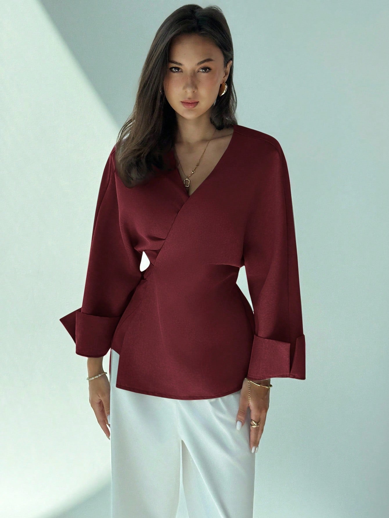 Waist cinched long sleeve blouse