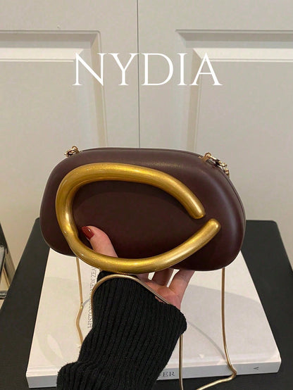 Metal decor clutch bag
