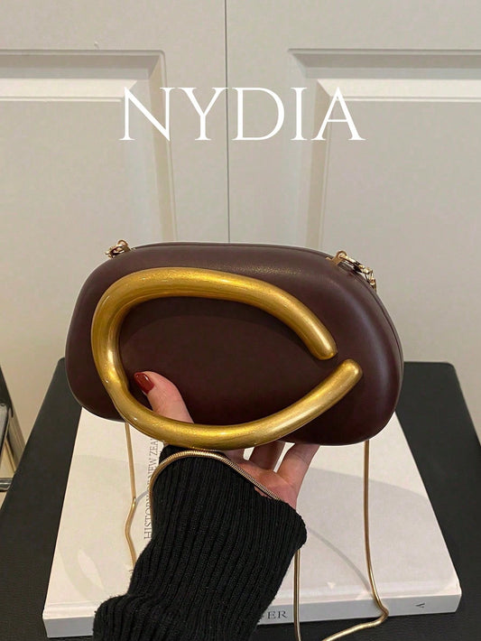 Metal decor clutch bag